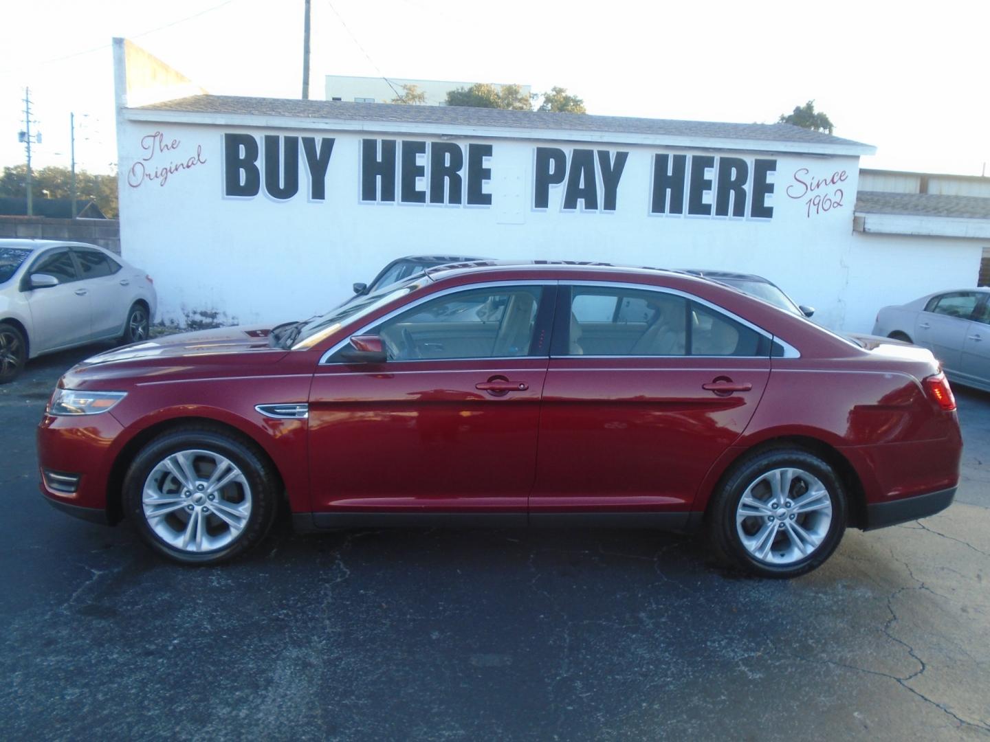 2016 Ford Taurus (1FAHP2E82GG) , located at 6112 N Florida Avenue, Tampa, FL, 33604, (888) 521-5131, 27.954929, -82.459534 - Photo#0